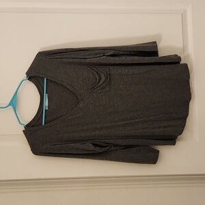 3/4 sleeve t-shirt with front pocket.